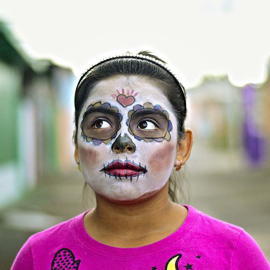 Woman with Painted Face Panteoncito School